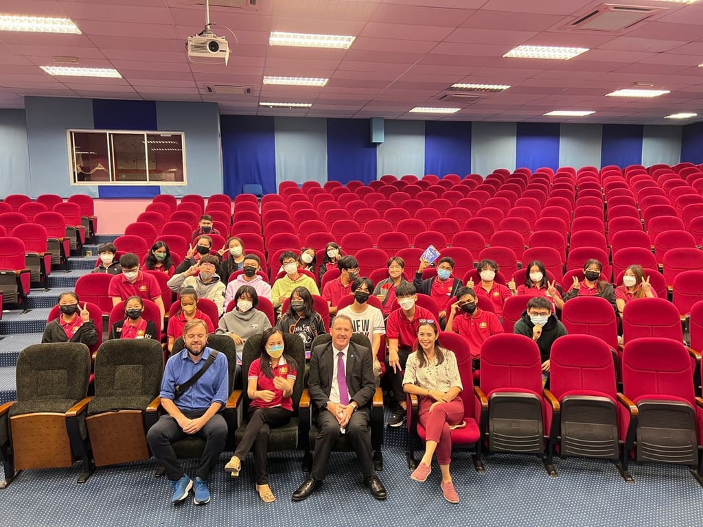 Secondary students gather for an academic briefing and engagement session in the school auditorium.