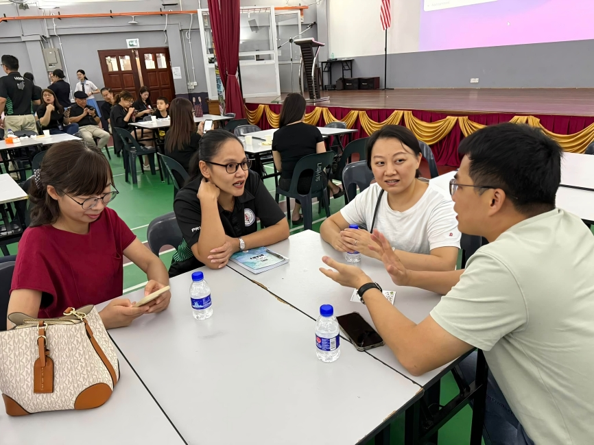 Parents collaborating with teachers to support their children’s academic journey.