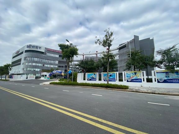 Modern exterior of The Dewey Schools Tay Ho Tay campus.