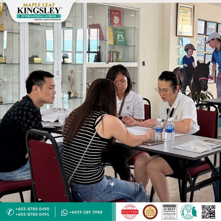 New parents and old attend the school's Coffee Meet event to meet the staff.
