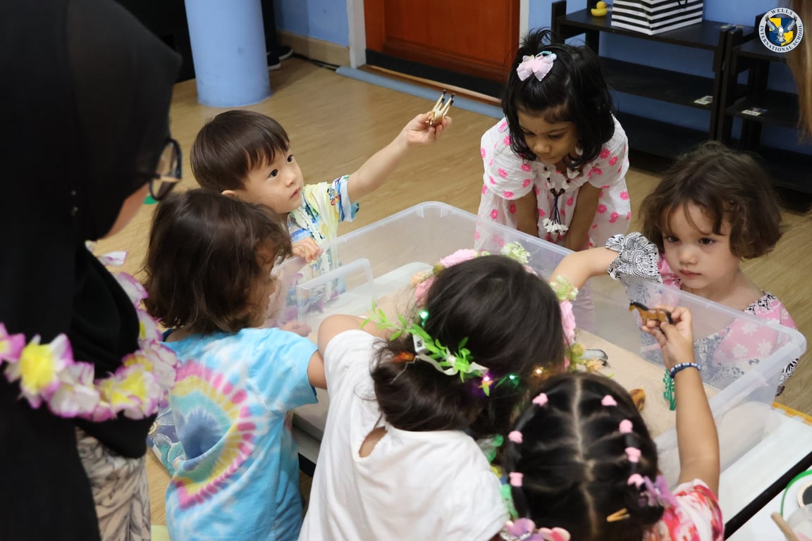 Students exploring cultural items during “Around the World in a Day.”