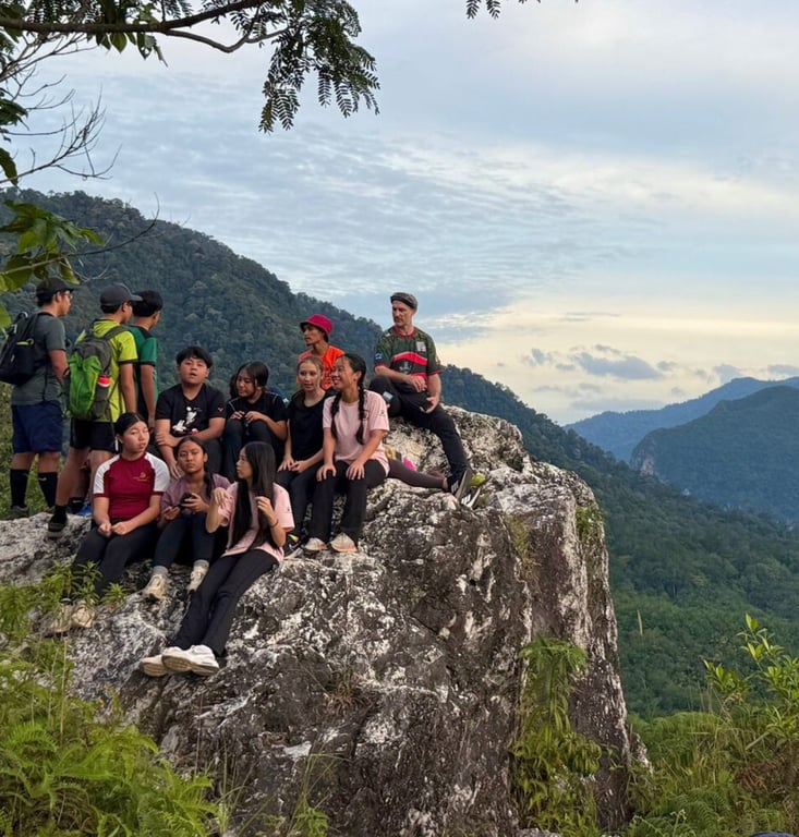 Students take in the views during a residential hiking expedition in the Bornean hills.
