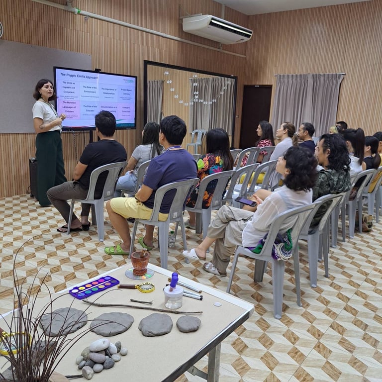 Parents attending a workshop on the Reggio Emilia approach in Early Years education.