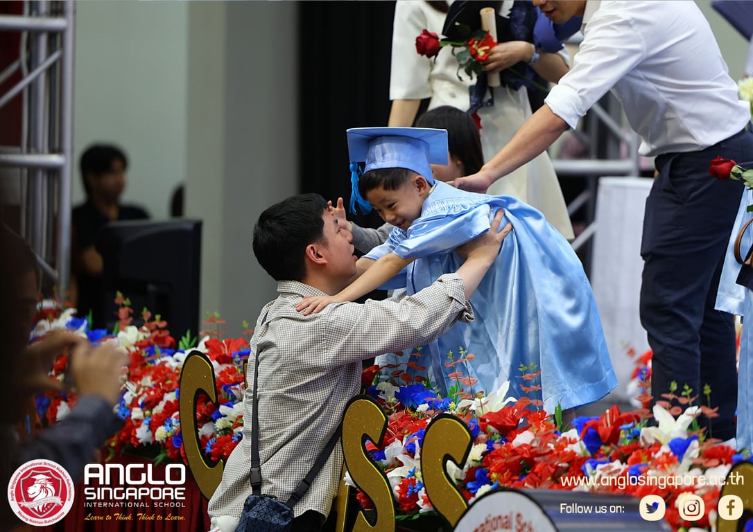 Parents supporting their children at the Graduation ceremony.