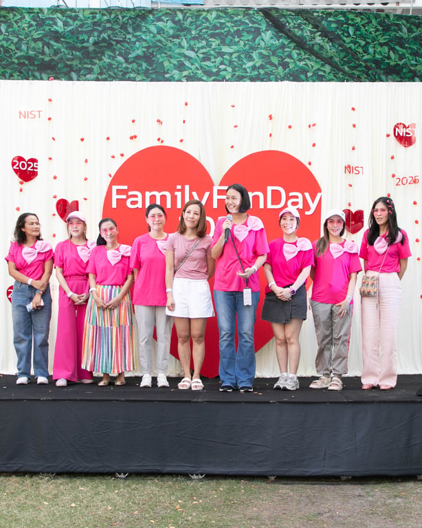 Families enjoying games, food, and rides at NIST Bangkok’s Family Fun Day .