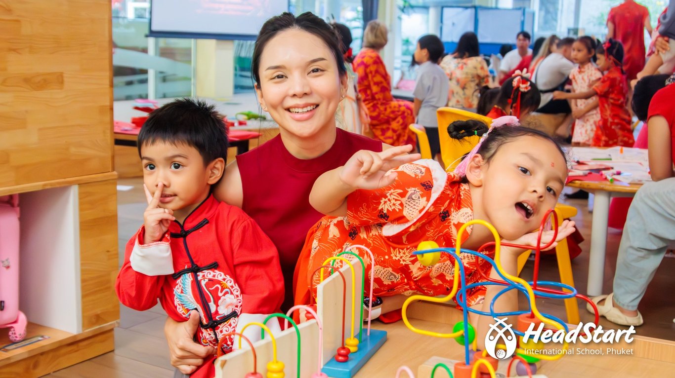 Parent and children celebrating Lunar New Year during Stay & Play activities.