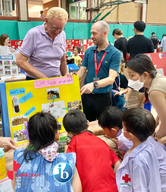 Parents and children discovering science projects side by side.