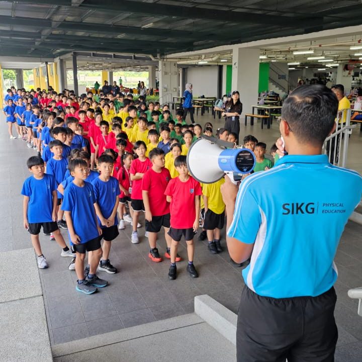 Students line up ahead of the Charity Run event, a day of celebration on campus for the entire school community