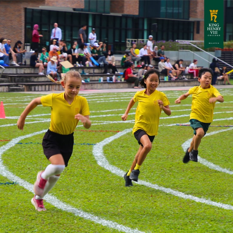 Students getting competitive during the races at Sports Day.