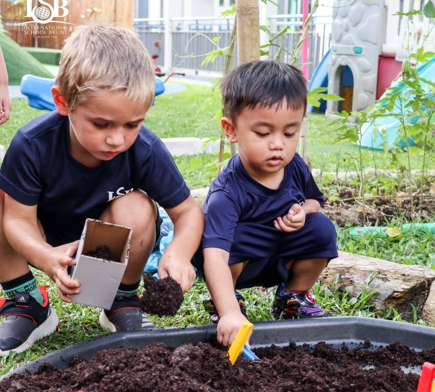 ISB Pre-Kindy children part take in a planting activity.
