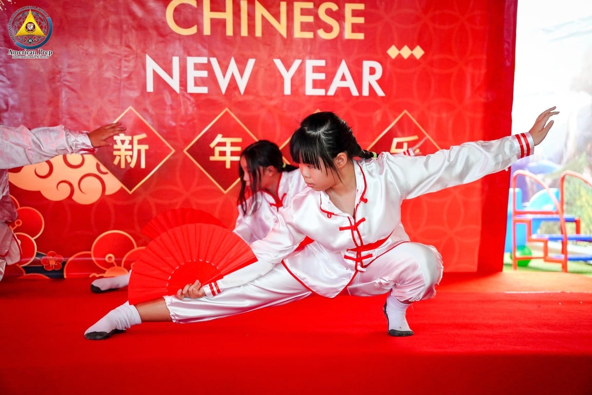 Traditional fan dance during Chinese New Year celebration.