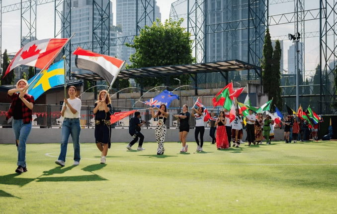 Parade of flags representing different countries.