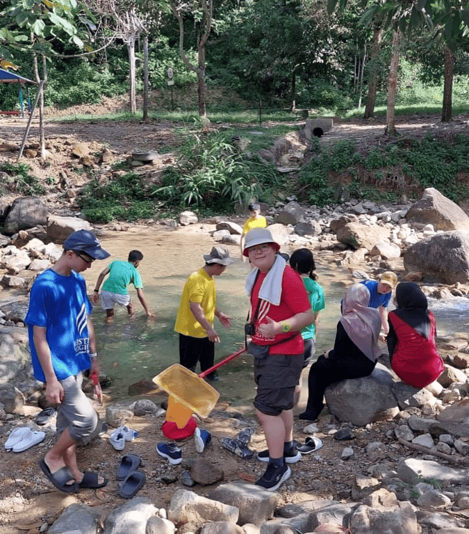A field trip to a local stream offers hands-on learning in a natural setting.