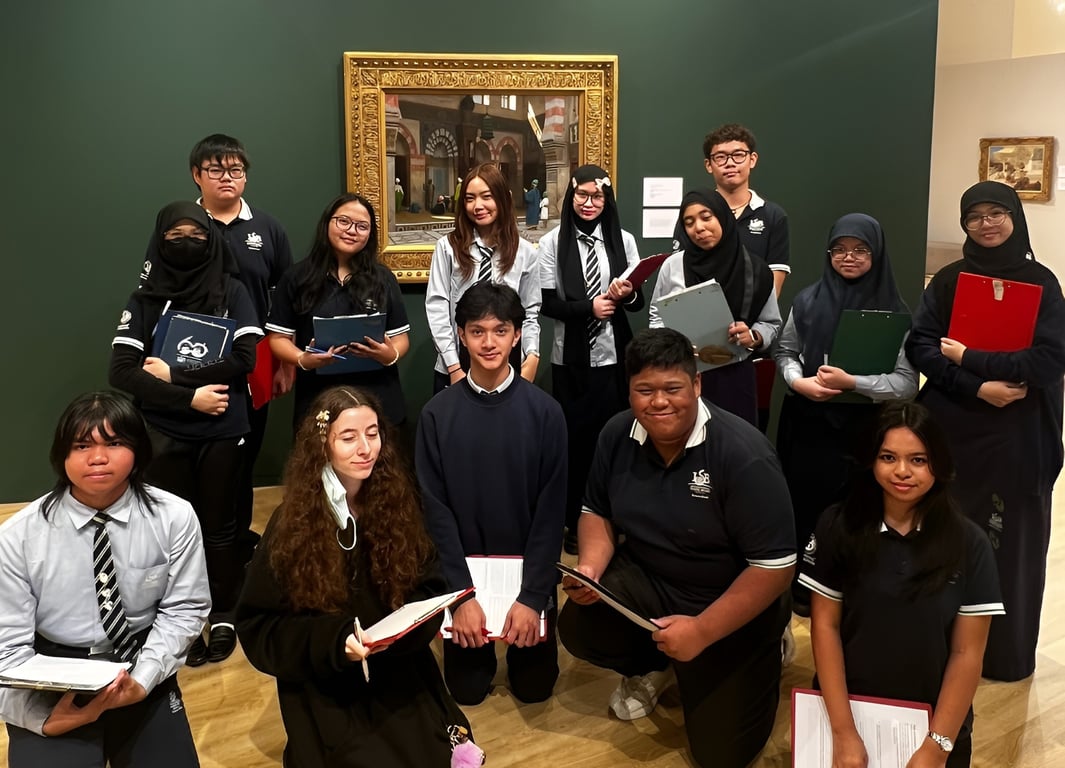 Secondary art students visit an art exhibition.