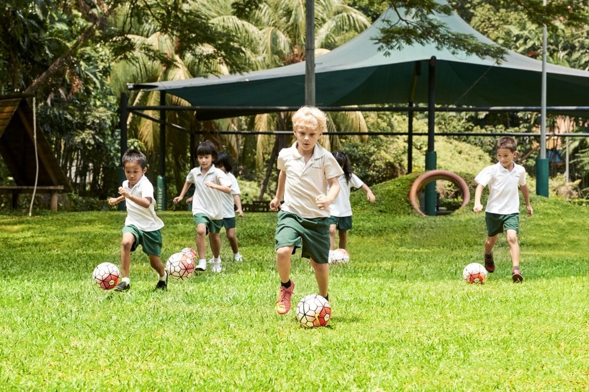 Students play outdoors during a Physical Education lesson