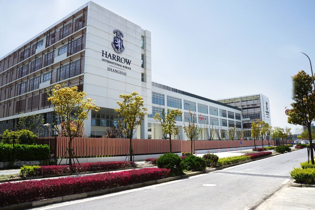 An exterior view of the modern academic buildings at Harrow International School Shanghai.