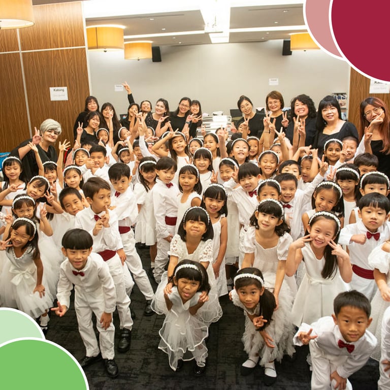 K2 students pose for a photo at their graduation ceremony