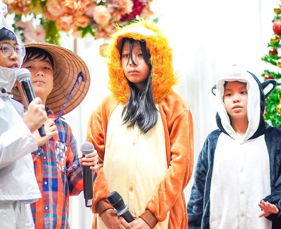 Christmas event performance featuring themed costumes.