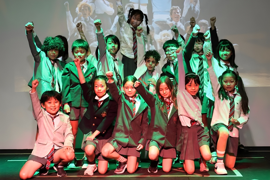 Learners shine on stage, showcasing creativity and self-expression.