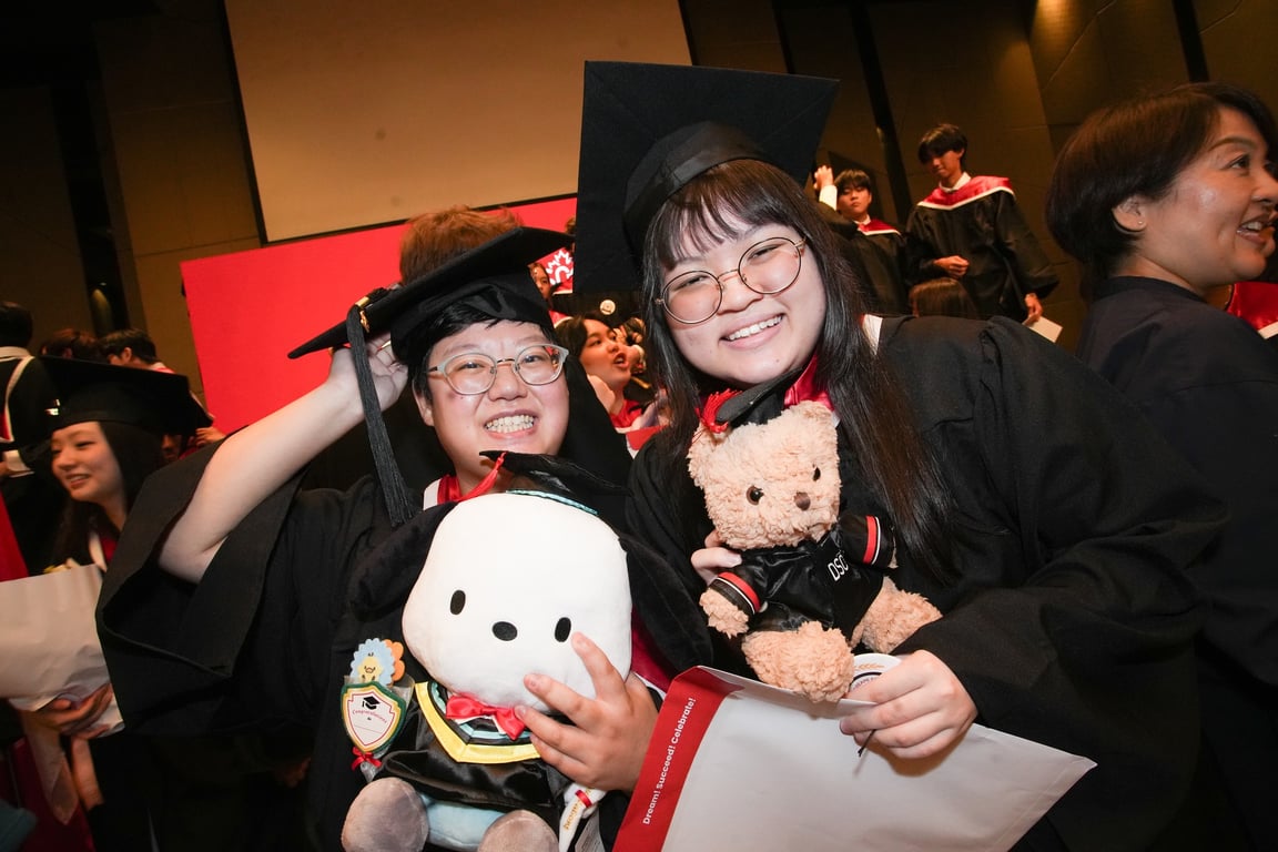 Graduates celebrating their success at the 2025 commencement ceremony.