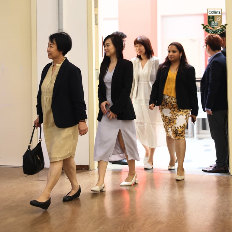 Teachers entering the hall for the graduation ceremony.