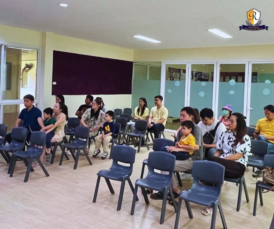 Parents attending the first day of school orientation.