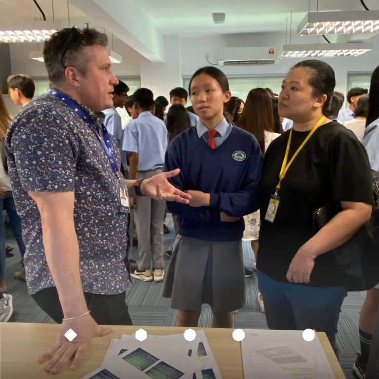 Parents and students receiving personalized consultation during options session.