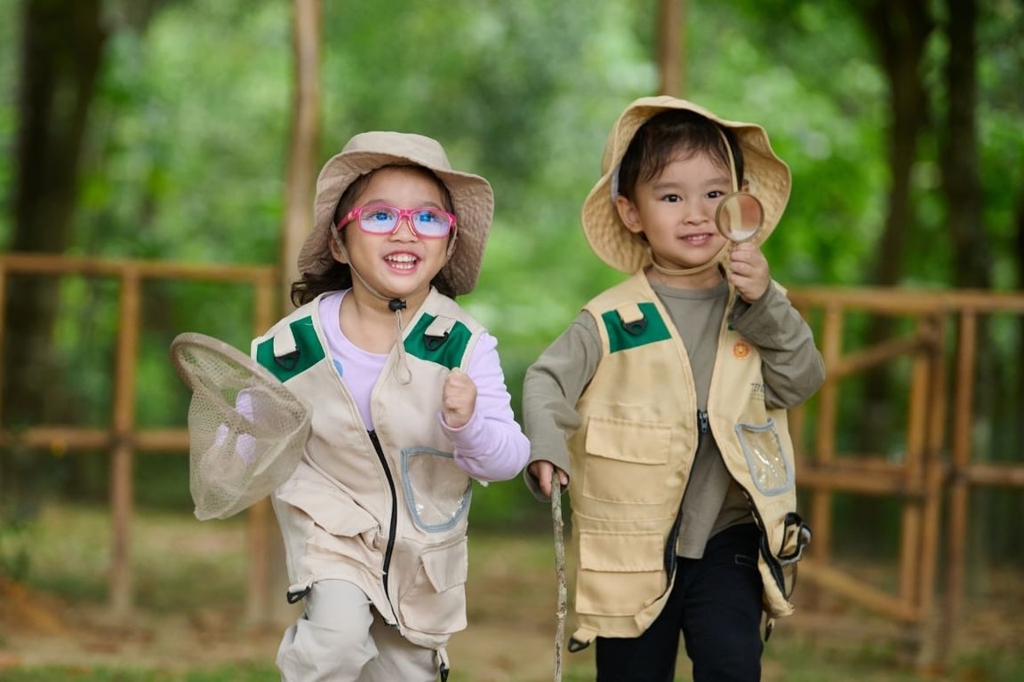 Key Stage 1 students exploring and learning through play at our on-site Nature School.