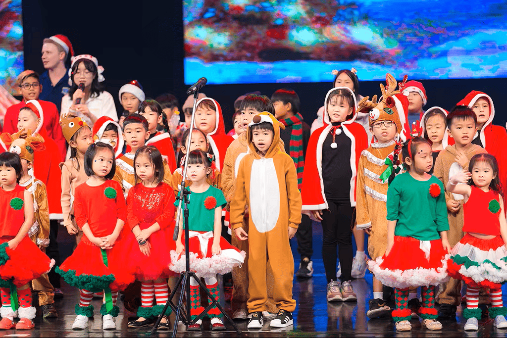 Students dressed up for a Christmas stage performance.