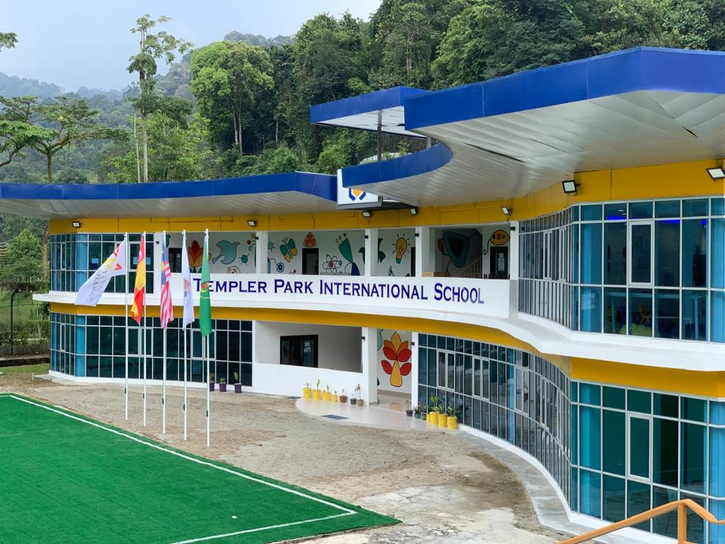 The school building, overlooking the sports field.