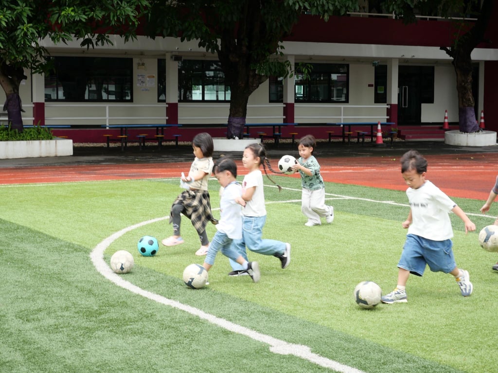 A group of students playing football.