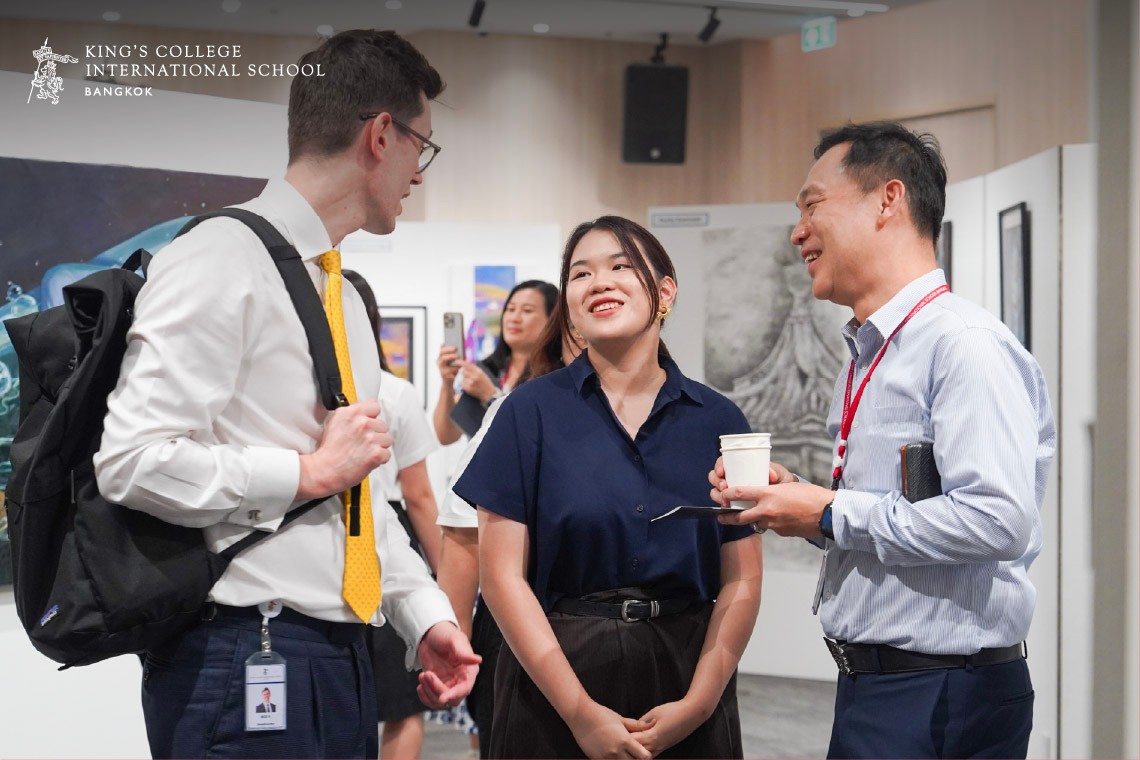 Parents and staff connecting during the A Level Art Showcase.