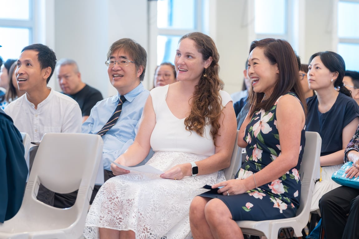 Parents and teachers enjoying the Grade 6 graduation ceremony.