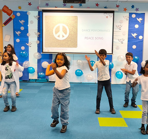 Students performing a dance as part of the co-curricular actvities offered