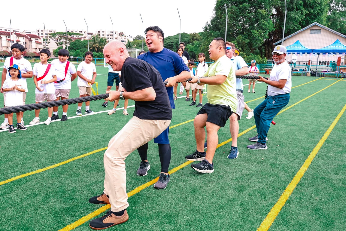 Parents getting involved in earning House points at the school's Sports Day 2025.