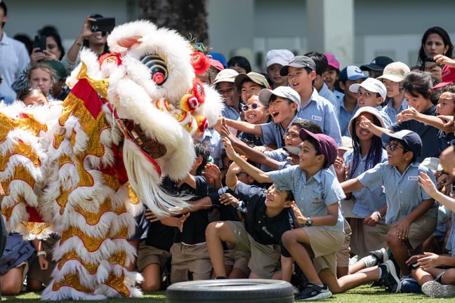 Students enjoy the school's annual Lion dance, a tradition deeply rooted in Chinese culture