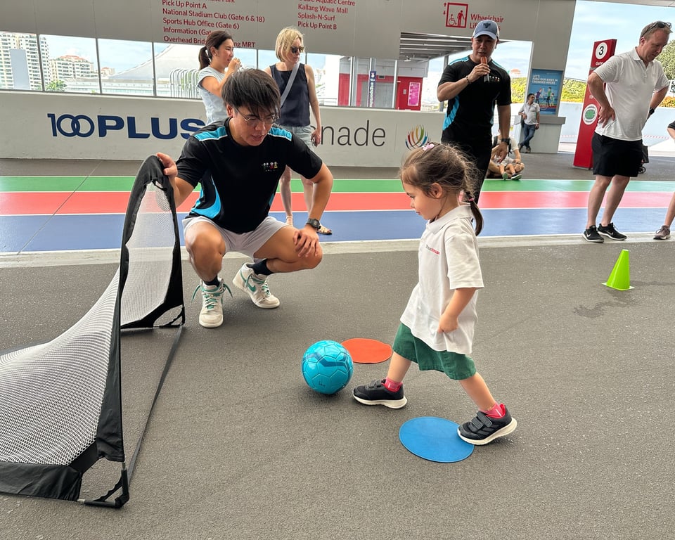 Children take on sports and physical challenges in front of their parents during Family Day