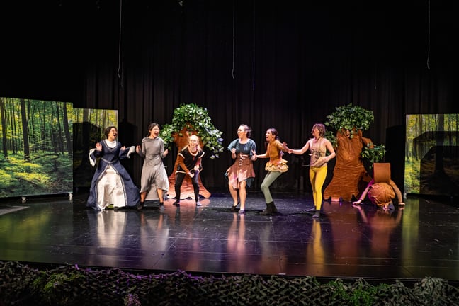 Students perform a lively scene from the Robin Hood stage production.
