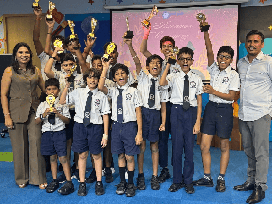 Celebrating achievement! Wise Oaks students proudly showcase trophies at the Ascension Ceremony.