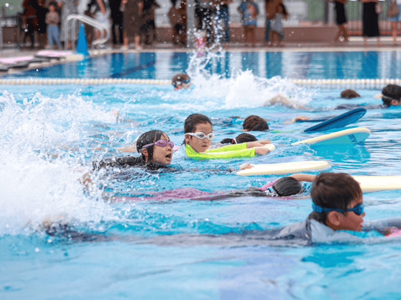Students participating in the "Swim Gala" event organized by RAS.
