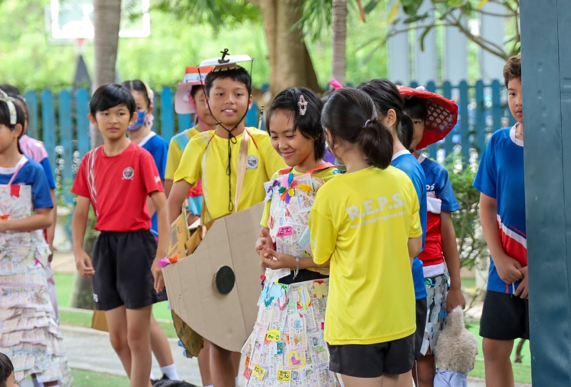 Students dressed up at a "Recycle" show.