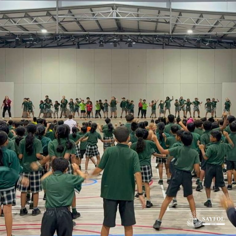 Year 4 students give a presentation on Sustainability during the 'Friday Jump Jam'.