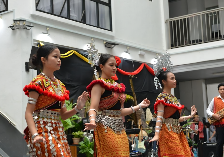 Students showcase Sarawakian heritage with grace and confidence in traditional dance performances.