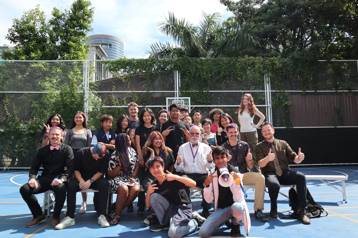 AISB community posing together for Movember Awareness.