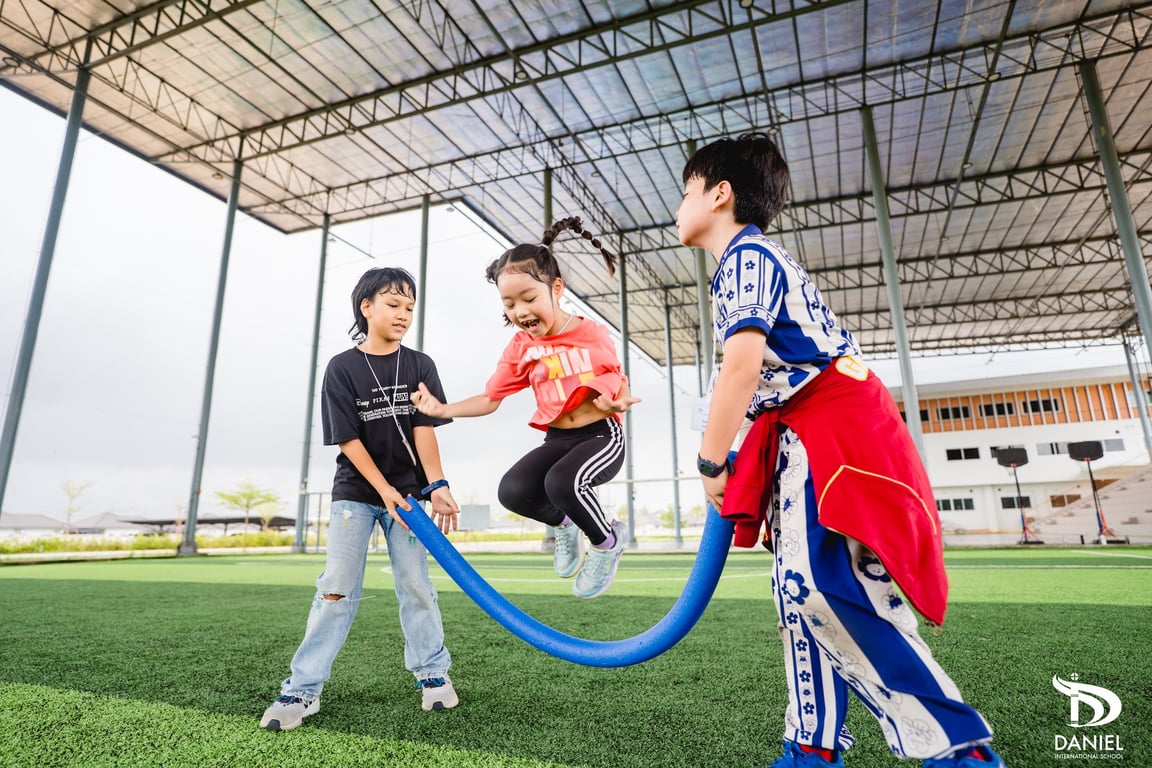 Students playing together during Global Sparks Summer Camp.