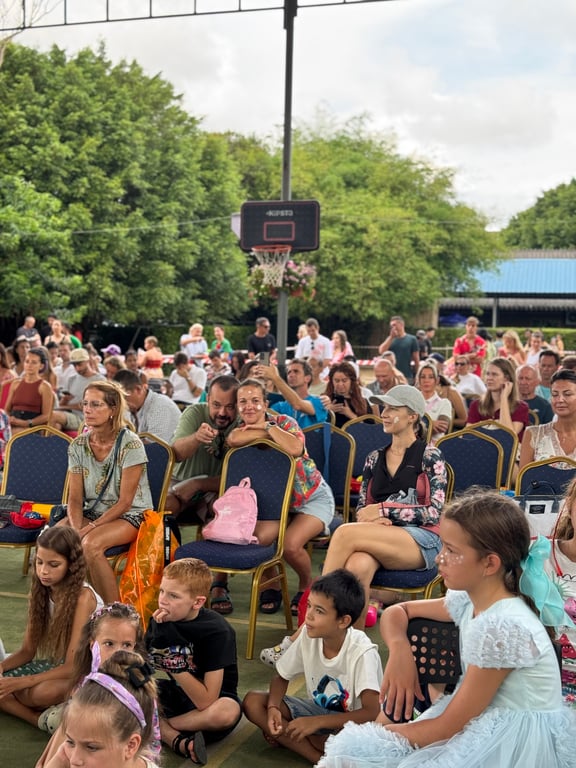 The school community enjoying performances.