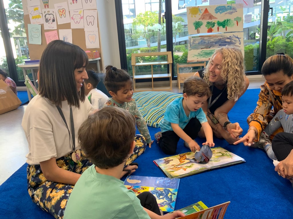 Parents and students reading books together during book week.