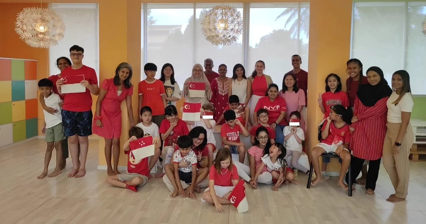 All Hands Together staff and students celebrating National Day