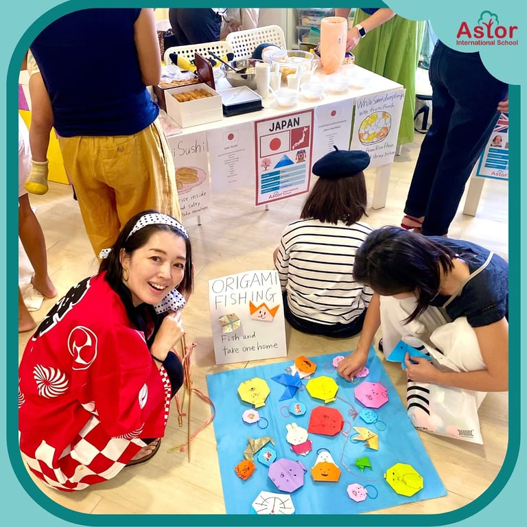 Parent volunteers come together on Astor’s International Day of Peace to showcase their own cultures to the class