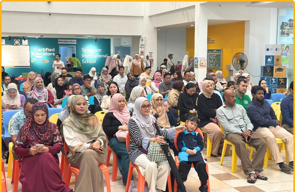 Parents attending an Orientation on the first day of the new academic year.